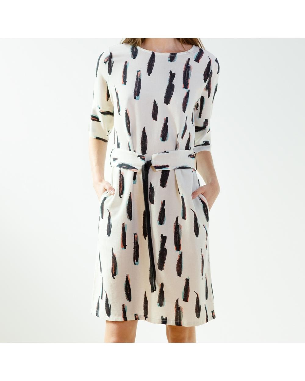 Vestido pan producto básico en color crudo con estampado de piceladas y bolsillos laterales